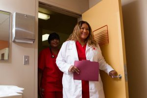 Doctor and Nurse Entering Room